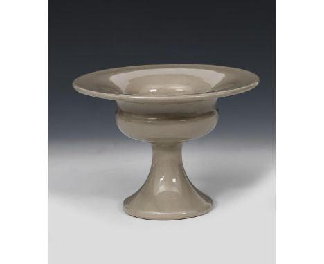 A Fulham Pottery vase designed by Constance Spry,  tapering stem foot supporting swollen bowl, covered in a celadon grey glaz