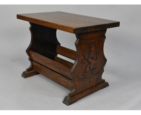 A Mid 20th Century Oak Magazine Table, End Panels Decorated in  Relief with Scottish Lion Rampant, 59cms Wide 