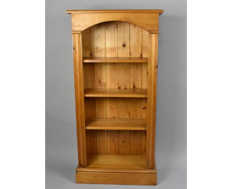 A Modern Pine Three Shelf Open Bookcase, 61cms Wide and 120cms High 