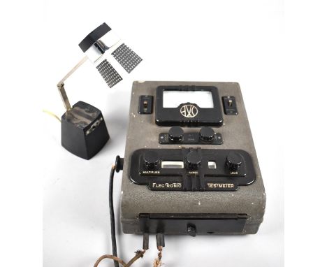 A Vintage AVC Electronic Test Meter together with a Modern Adjustable Work Lamp 