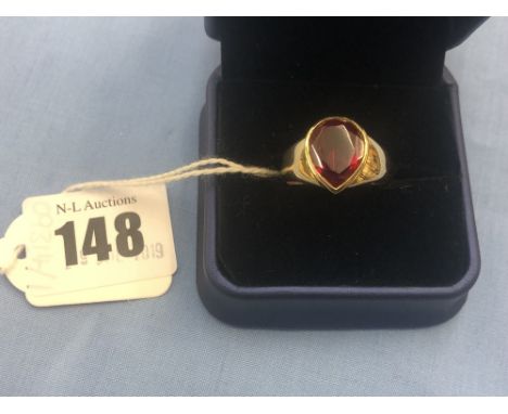 A 9ct gold and ruby ring size R