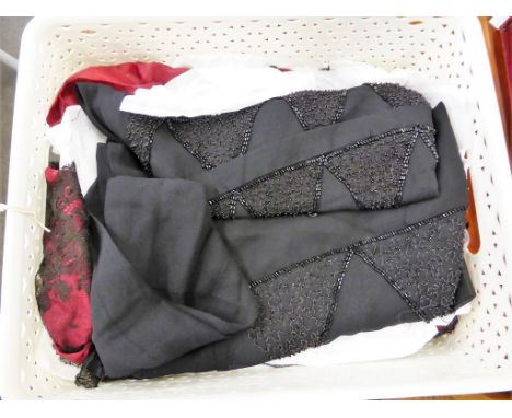 An original vintage beadwork flapper dress,  1920's, black rayon with the main body having black bead diamond trellis design,