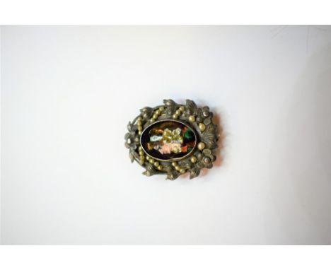 An antique silver and enamel portrait scarf brooch,  