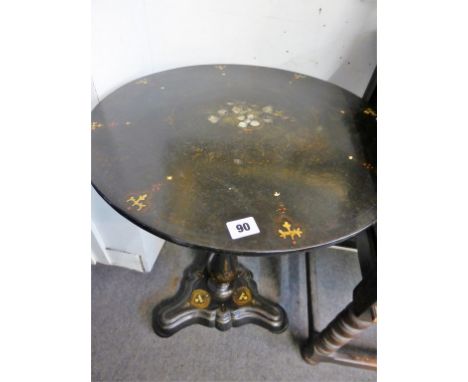 A Victorian paper mache pedestal tilt-top side table.  decorated with flowers & inlaid with mother of pearl. 