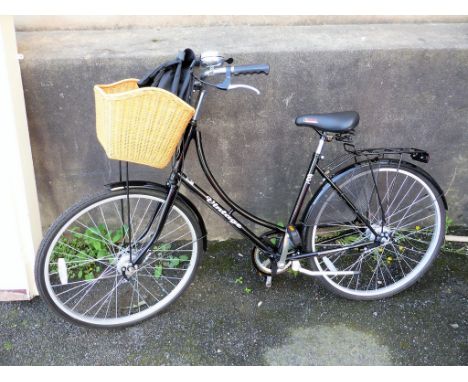 A Bronx Vintage ladies shopper bike, 3 gears, front basket and rear carrier plus panniers.  