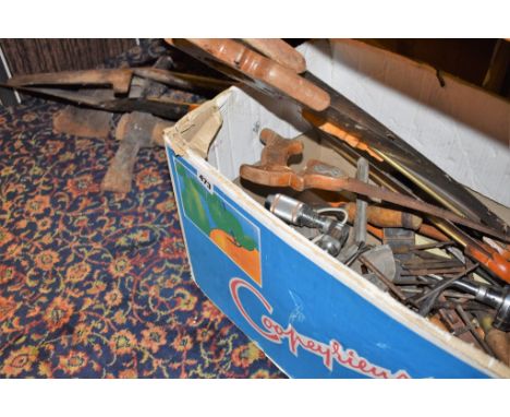 A collection of vintage tools to include spades, saws, chisels, hand drill etc (qty). 