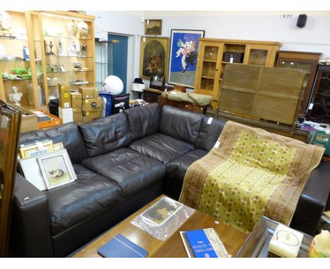 A brown leather corner sofa. 