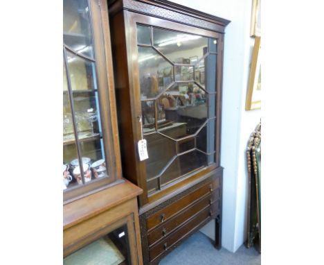 A vintage mahogany display/bookcase on three drawer stand, 67in. (170cm.) high. 