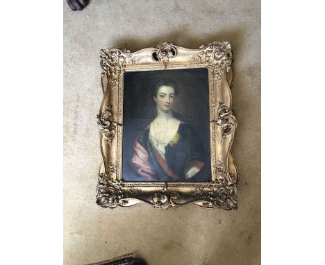 An 18thC portrait of a lady, oil on canvas in original swept gilt frame (bad tear and repair ( 44x35cms)
