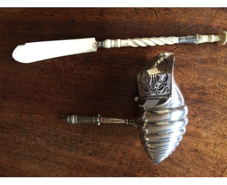 Nautilus shaped ivory handled ladle with hinged fretted lid.