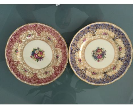 Pair Royal Worcester cabinet plates with hand painted floral centres one signed M Millward