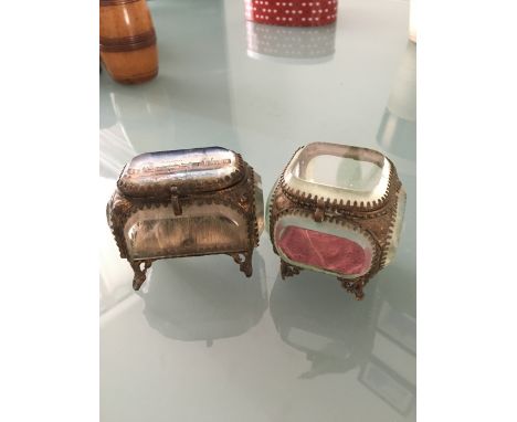 Two small gilt metal and glass trinket boxes