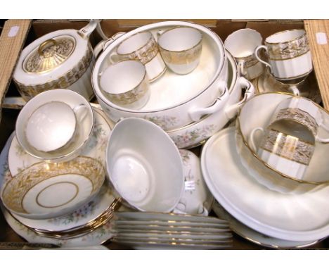 A 19th century gilt heightened part tea service comprising teapot and coffee cans etc and a Duchess Lansbury pattern part tea