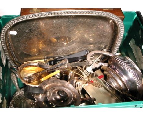A quantity of assorted plated ware to include knives, forks, spoons, teapot, salver with a gallery trim etc.