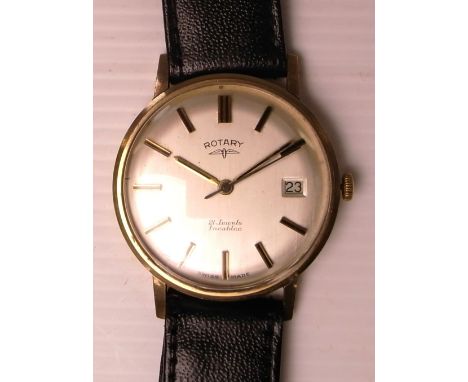 Rotary; a yellow metal gentlemans automatic wristwatch, dial set with gilt batons and date aperture, on original leather stra