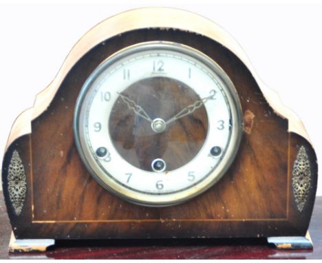 An oak cased mantel clock, a mid 20th century clocking on clock, a mahogany cased weather station, a vintage West Clocks mant