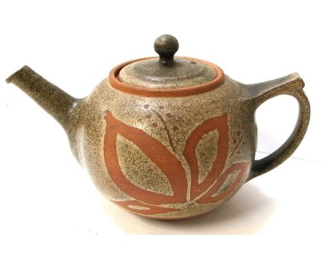 A Simone Kilburn (Troika) teapot decorated with opposing floral motifs, initialled S.K to the base, height 14cm.