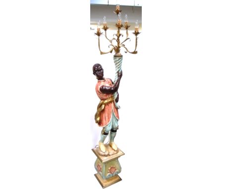 A modern Blackamoor lamp supporting a six branch gilded candelabrum, height approx 78cm.