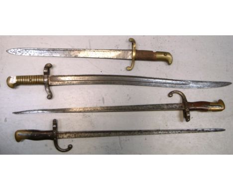 Two 19th century French bayonets and two further bayonets (all lacking scabbard) (4).