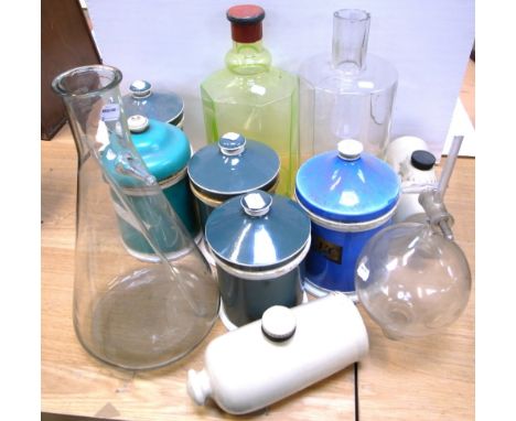 Five ceramic chemist display jars, two stone vintage hot water bottles and various pieces of chemist glass.