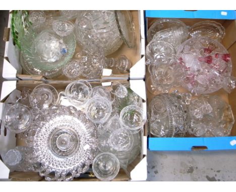 A quantity of glassware to include a glass stand, decanters, drinking glasses etc.