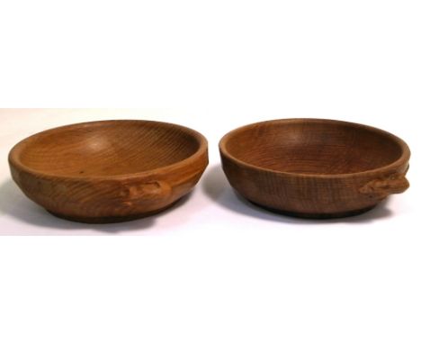 A pair of Robert "Mouseman" Thompson nut bowls, diameter of both 15cm (2). CONDITION REPORT Some wear commensurate with age. 