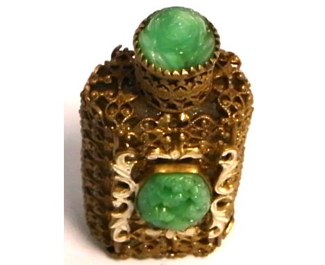 A Chinese inspired scent bottle with jade coloured glass panels to the lid and front within a metal pierced frame, height 6.5