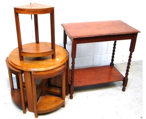 A mahogany side table with lower shelf on barley twist supports and a light oak four section dividable occasional table (2).