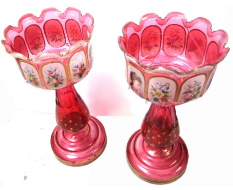 A pair of early 19th century Bohemian cranberry glass lustres, with portrait and florally decorated panels, height of both 37