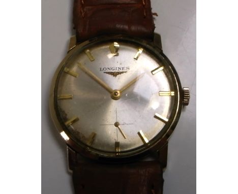 Longines; a 1940s manual wind dress watch with high grade 17 jewel calibre 370 movement, satin dial with applied gold baton  