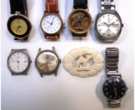 A vintage black faced gentlemans wristwatch, the dial set with Roman numerals and marked "Services", a vintage gentlemans wri