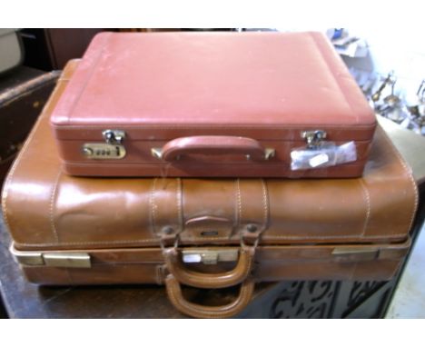 A vintage fitted leather suitcase by Eveleigh and a further vintage briefcase by Antler (2).