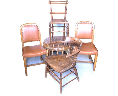 An Edwardian oak captain's chair and a round walnut occasional table, an Edwardian bedroom chair and two faux leather vintage