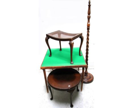 A small round oak occasional table on pad feet, an early 20th century hand caned footstool on pad feet, a late 19th early 20t