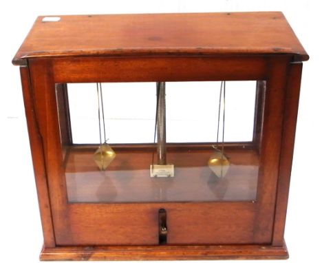 A 19th century set of mahogany cased Sone of Gloucester Street, London chemists scales.