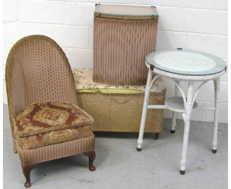 A Lloyd Loom style circular glass topped occasional table with lower shelf, diameter 55cm, a Lloyd Loom style chair, a linen 