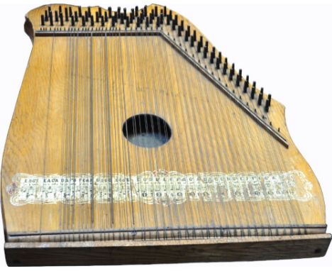 A shaped zither harp, length 54cm.