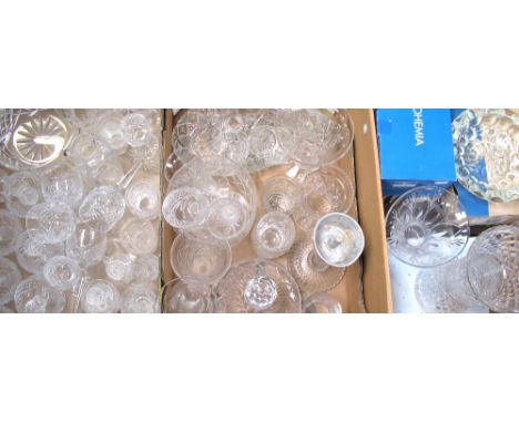 A large quantity of cut glass and crystal glassware to include vases, decanters and drinking glasses etc.