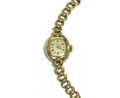 Everite; a ladies 9ct gold vintage wristwatch with pierced bracelet and rounded rectangular dial, gold weight approx 10g.