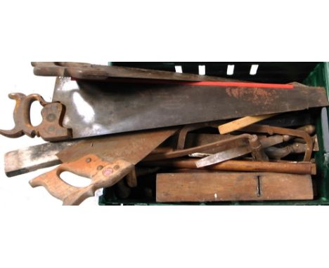 A quantity of vintage tools to include saws, squares, files, a bit and brace etc.