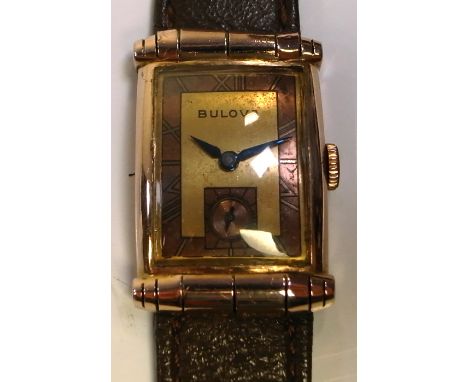 Bulova; a 1940s gentlemans tank style wristwatch with calibre 8E21 jewel manual wind movement, yellow and copper dial with bl