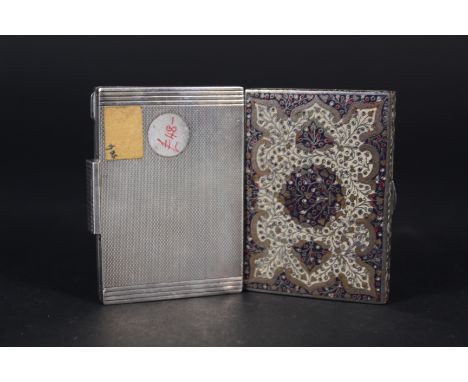 A continental silver Art Deco style compact together with a white metal enamel decorated case