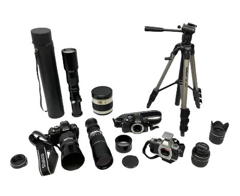 Three Olympus Camera bodies, comprising of OM-D E-M5, E-400 and E-450,   together with 'Samyang Mirror Lens 800mm 1:8.0DX', O