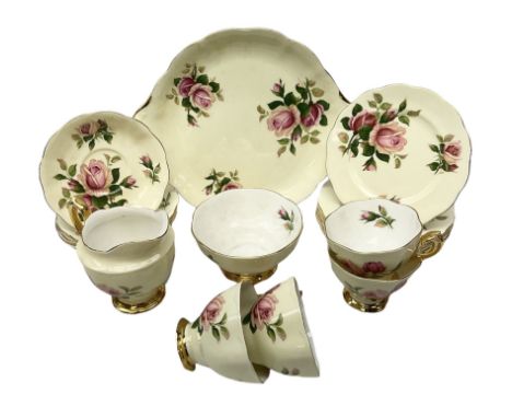 Royal Albert part tea service for four decorated in the 'English Beauty' pattern, comprising four teacups, five saucers, seve
