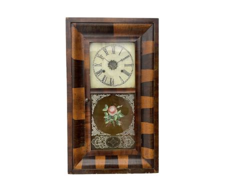 An American Ogee shelf clock in a contrasting mahogany veneered case,c1890, with a square painted dial, Roman numerals and mi