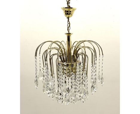 1970s Italian Murano waterfall gilt chandelier, with slim curved branches decorated with faceted droppers on three tiers with