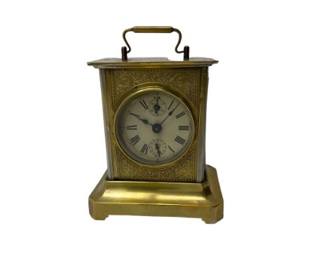 A German Juhngans �Joker� carriage clock with a musical alarm c1890, with a circular card dial with roman numerals, minute tr