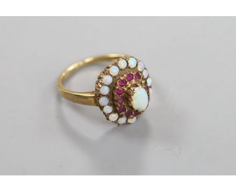   A 1960's 9ct gold, ruby and white opal set cluster ring (ruby missing),size P, gross 4.1 grams.