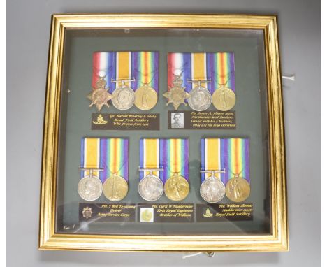   Five WW1 medal groups in one frame.Trio to Sgt Harold Brearley L-28064 RFATrio to 16339 Pte James A. Hinson, Northumberland