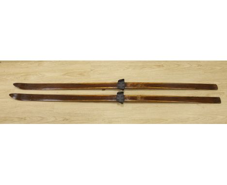   A pair of vintage wood skis, length 210cm